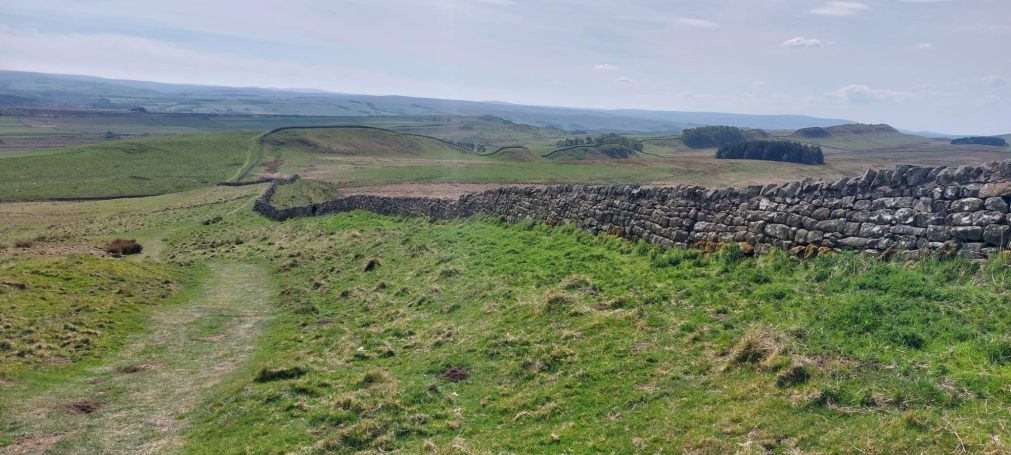 Landscape view of the Hadrian's wall with wall shown in distance
