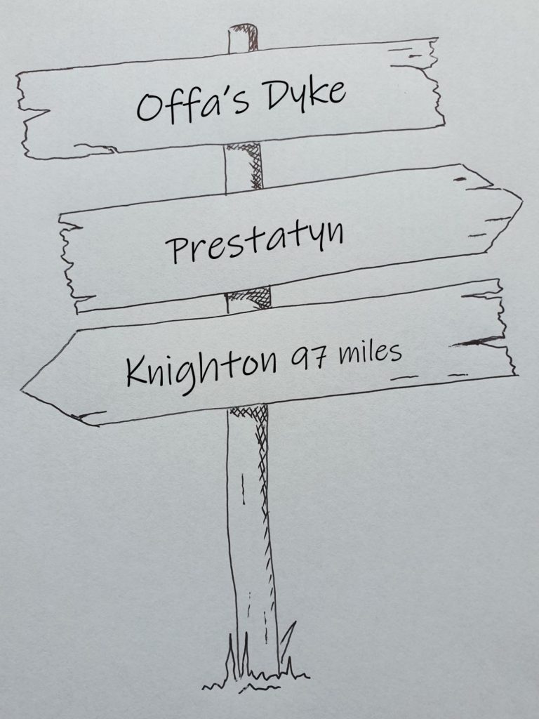 Hand drawn sign showing the Offa's Dyke Knighton to Prestatyn 98 miles