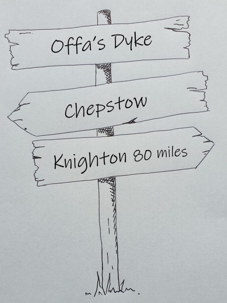 Hand drawn sign post showing Offa's Dyke Chepstow to knighton 78 miles 