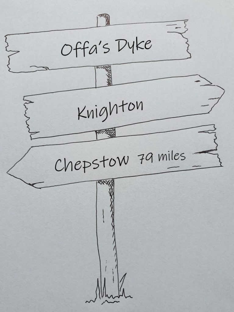 Hand drawn sign post showing Offa's Dyke Chepstow to knighton 78 miles 