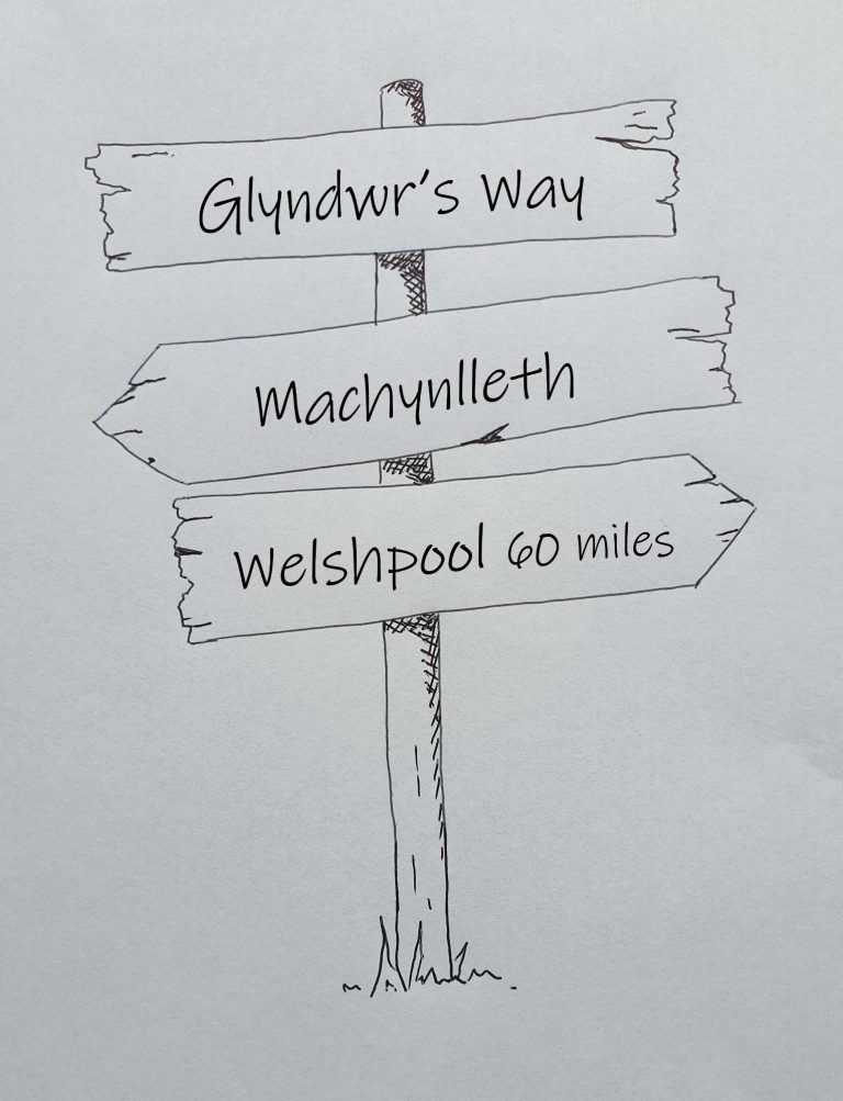 Hand drawn sign post showing Glyndwr's Way Machynlleth to Welshpool 60 miles