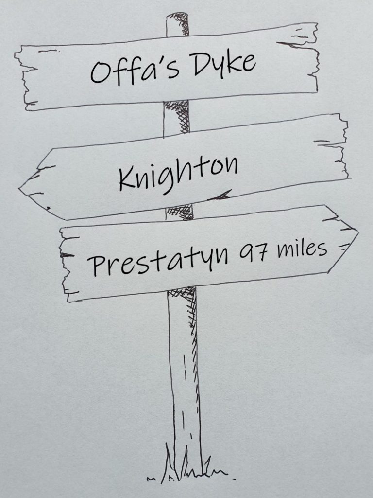 Hand drawn sign showing the Offa's Dyke Knighton to Prestatyn 98 miles