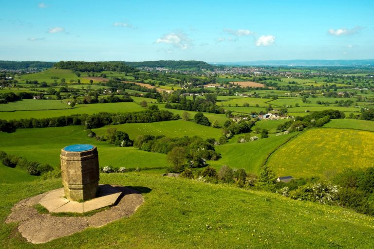 View over green fields from Coaley Peak