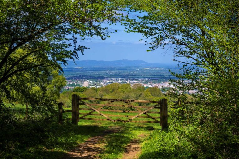 Gateway on the Cotswold way path, looking over the Cotswolds view